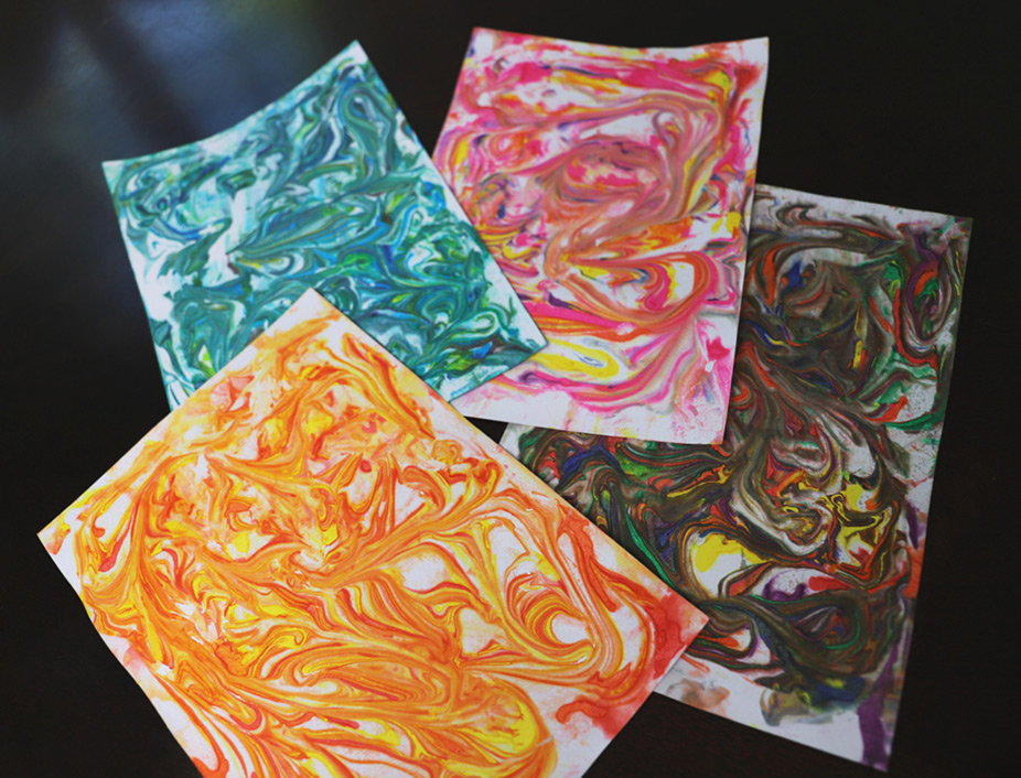 shaving cream and dye marbled paper in different patterns and colors