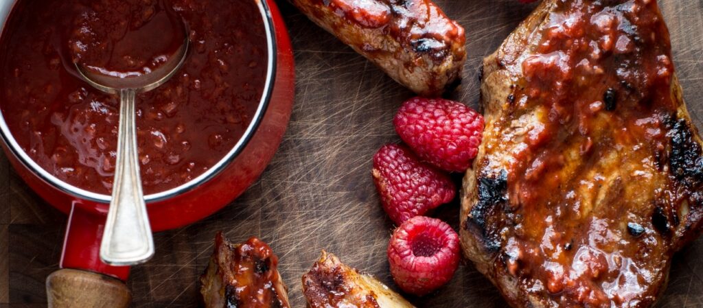 juicy-juice-pork-chops-with-apple-raspberry-barbecue-sauce