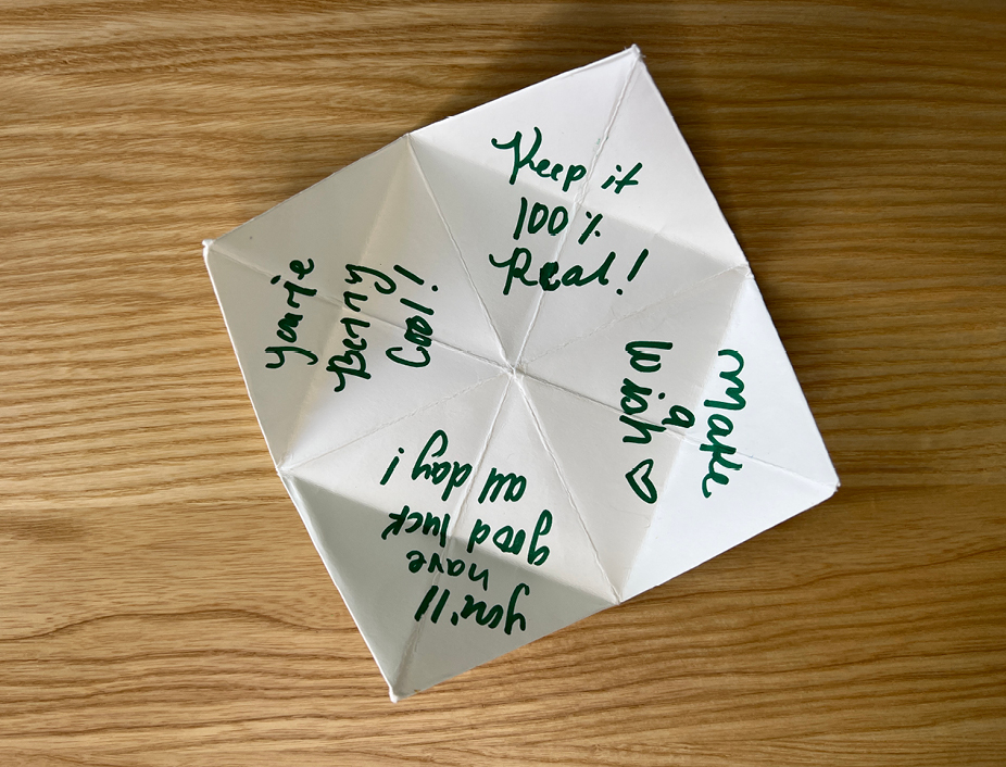 Decorated fortune teller with writing on the inside. like keep it 100% real!